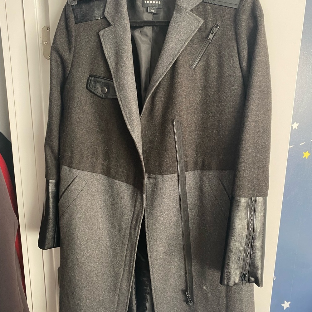 Black and grey coat with leather accents.